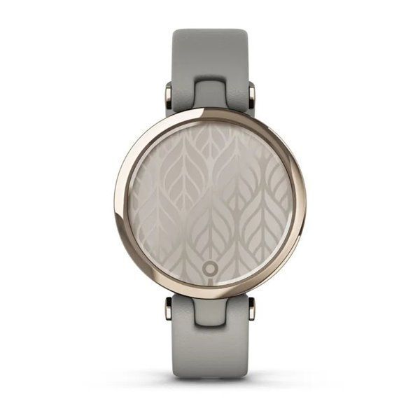 Garmin Lily Classic smartwatch with a cream-gold bezel, gray case, and Italian leather strap