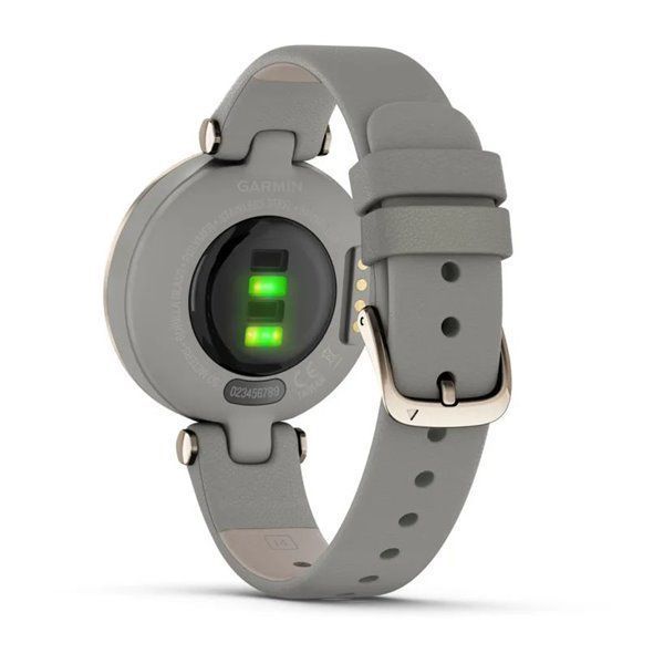 Garmin Lily Classic smartwatch with a cream-gold bezel, gray case, and Italian leather strap