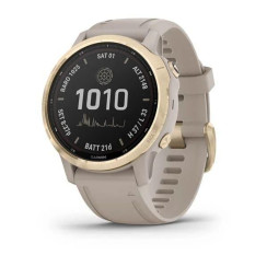 Garmin Fenix ​​6S Pro Solar smartwatch in gold with a light beige silicone strap