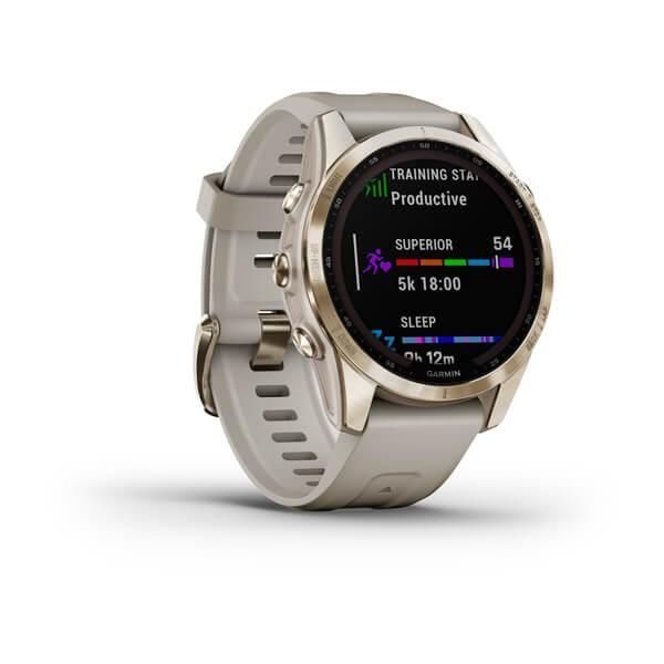 Garmin Fenix ​​7S Sapphire Solar Smartwatch in Gold Titanium with a Light Beige Strap
