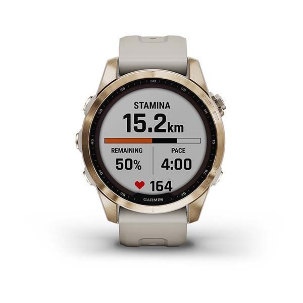 Garmin Fenix ​​7S Sapphire Solar Smartwatch in Gold Titanium with a Light Beige Strap
