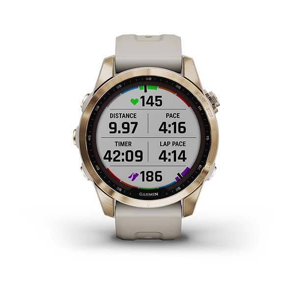 Garmin Fenix ​​7S Sapphire Solar Smartwatch in Gold Titanium with a Light Beige Strap