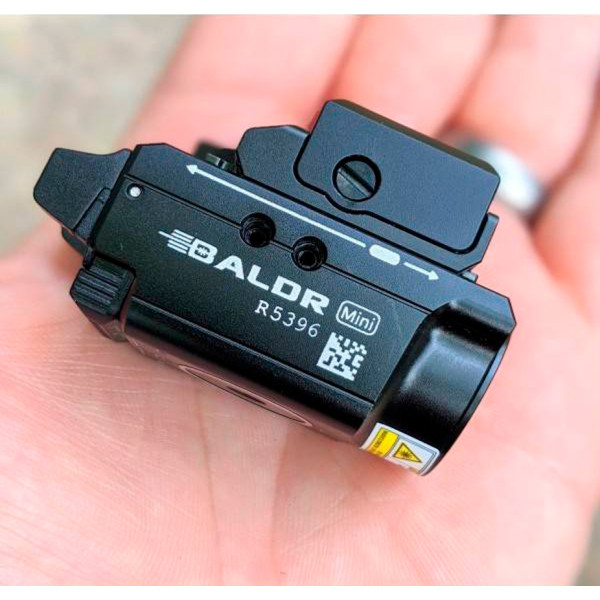 Olight Baldr Mini Black Flashlight with Laser Designator. Green Laser Designator.